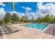 Large community pool with ample seating, ideal for relaxation and social gatherings at 442 Anessa Rose Loop, Ocoee, FL 34761