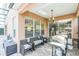 Outdoor patio perfect for grilling and dining, with seating and a well-maintained grill at 442 Anessa Rose Loop, Ocoee, FL 34761