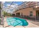 Spacious screened-in pool with brick paving, perfect for summer fun and relaxation at 442 Anessa Rose Loop, Ocoee, FL 34761