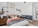 Bright bedroom features a modern wall decor, stylish desk, and soft carpet at 4709 Flagstaff Ct, Orlando, FL 32820