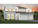 Stunning two-story home with a three-car garage and charming architectural details at 4709 Flagstaff Ct, Orlando, FL 32820