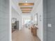Inviting foyer with wooden beam ceiling and hardwood floors leading into the home at 4709 Flagstaff Ct, Orlando, FL 32820