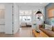 Open-concept design featuring a living room and primary bedroom, blending seamlessly for a modern and inviting living experience with natural light at 4709 Flagstaff Ct, Orlando, FL 32820
