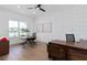 Bright office space with a large window and modern decor, perfect for remote work at 4709 Flagstaff Ct, Orlando, FL 32820
