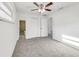 Bright main bedroom with ceiling fan, closet, and ensuite bathroom access at 5144 Orange Ave, Winter Park, FL 32792