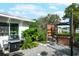 Cozy back patio features a modern grill and outdoor seating area, ideal for entertaining and relaxing at 5301 Pineview Way, Apopka, FL 32703