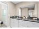 Bathroom features a granite countertop, white cabinets, and a glass-enclosed shower at 5301 Pineview Way, Apopka, FL 32703