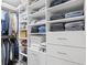 Organized walk-in closet with shelving, hanging space, and drawer storage at 5301 Pineview Way, Apopka, FL 32703