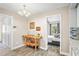 Dining area featuring wood floors and view to bedroom at 5301 Pineview Way, Apopka, FL 32703
