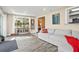 Open-concept living area with natural light, views to kitchen, and stylish decor at 5301 Pineview Way, Apopka, FL 32703