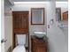 Unique bathroom with a modern vessel sink, decorative cabinet, and a decorative mirror at 622 Mount Homer Rd # 622, Eustis, FL 32726