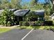 Charming home with well-maintained landscaping, lush greenery, and a private parking area in a quiet neighborhood at 622 Mount Homer Rd # 622, Eustis, FL 32726