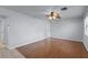 Spacious living room with hardwood floors and neutral walls, offering a clean and modern aesthetic at 622 Mount Homer Rd # 622, Eustis, FL 32726