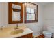 Bathroom featuring wooden cabinet, sink, and tile flooring at 639 John Anderson Dr, Ormond Beach, FL 32176