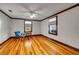 Bedroom featuring wood floors and windows offering natural light at 639 John Anderson Dr, Ormond Beach, FL 32176