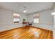 Bright bedroom with hardwood floors and two windows at 639 John Anderson Dr, Ormond Beach, FL 32176