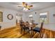 An inviting dining room featuring beautiful hardwood floors, and plenty of natural light at 639 John Anderson Dr, Ormond Beach, FL 32176