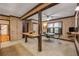A spacious dining room featuring wood walls and tiled floors, plus a breakfast bar at 639 John Anderson Dr, Ormond Beach, FL 32176