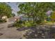 Two story traditional home with blue shutters and lush landscaping at 639 John Anderson Dr, Ormond Beach, FL 32176