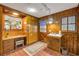 Versatile mud room with built-in desk, sink, and ample storage provides functionality and charm at 639 John Anderson Dr, Ormond Beach, FL 32176