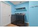 Laundry room features modern washer and dryer appliances at 6402 Beechnut Dr, Lakeland, FL 33813