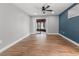 A spacious living room leads out to the enclosed back patio at 6402 Beechnut Dr, Lakeland, FL 33813