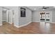 Bright, open living room with wood floors, neutral walls, and stylish decor at 6402 Beechnut Dr, Lakeland, FL 33813