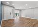 Inviting living room featuring wood floors, neutral tones, and natural light at 6402 Beechnut Dr, Lakeland, FL 33813