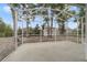 Spacious screened porch with views of the backyard and mature trees at 741 Mystic Oaks Ln, Deland, FL 32724