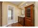 Stylish bathroom with a vanity and hardwood floors at 7423 Elsworth Ct, Orlando, FL 32819