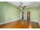 Spacious bedroom with hardwood floors and ample closet space at 7423 Elsworth Ct, Orlando, FL 32819