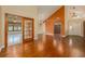 Open-concept living space with hardwood floors and stylish lighting at 7423 Elsworth Ct, Orlando, FL 32819