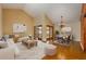Bright living room featuring hardwood floors and elegant furnishings at 7423 Elsworth Ct, Orlando, FL 32819