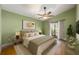 Comfortable main bedroom with a ceiling fan and access to the outdoors at 7423 Elsworth Ct, Orlando, FL 32819