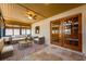 Cozy porch with comfortable seating and natural light at 7423 Elsworth Ct, Orlando, FL 32819