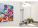 Close up of colorful 'Alice in Wonderland' themed bathroom art at 7487 Oakmoss Loop, Davenport, FL 33837