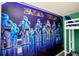 Themed bedroom with a 'Star Wars' mural, providing a fun and imaginative space at 7487 Oakmoss Loop, Davenport, FL 33837