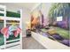 Charming room featuring bunk beds and a whimsical Disney themed mural at 7487 Oakmoss Loop, Davenport, FL 33837