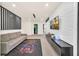 Open game zone with comfortable seating, TV and gaming-themed decor at 7487 Oakmoss Loop, Davenport, FL 33837