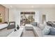 Bright open living space with large sliding doors to backyard patio and pool at 7487 Oakmoss Loop, Davenport, FL 33837
