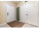 Well-lit entryway with tile flooring, coat closet and access to the rest of the home at 7654 Comrow St # 104, Kissimmee, FL 34747