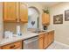 Modern kitchen with stainless steel appliances and lots of cabinet space at 7654 Comrow St # 104, Kissimmee, FL 34747