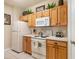 Functional kitchen featuring ample counter space and modern appliances at 7654 Comrow St # 104, Kissimmee, FL 34747