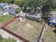 Home features a fenced backyard, a small storage shed, and ample green space for outdoor activities and relaxation at 810 Catalina Dr, Sanford, FL 32771