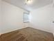 Cozy bedroom with plush carpeting and a window for natural light at 810 Catalina Dr, Sanford, FL 32771