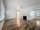 Bright living room with fireplace and hardwood flooring at 810 Catalina Dr, Sanford, FL 32771