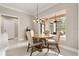Cozy breakfast nook with natural light creates the perfect spot for enjoying morning coffee or a casual meal at 8800 Torey Pines Ter, Orlando, FL 32819