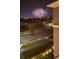 Neighborhood view with fireworks, showcasing a beautiful community with evening celebrations at 9224 Legado Dr, Windermere, FL 34786