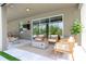 Comfortable outdoor seating area with fire pit, perfect for relaxing and enjoying the outdoors at 9224 Legado Dr, Windermere, FL 34786
