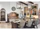 Elegant kitchen featuring custom cabinetry, a large island, and modern lighting fixtures at 10138 Enchanted Oak Dr, Golden Oak, FL 32836